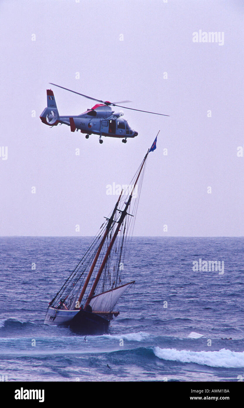 Helicopter rescue from Cabin Fever shipwreck, Tory Island, Co Donegal, Ireland Stock Photo