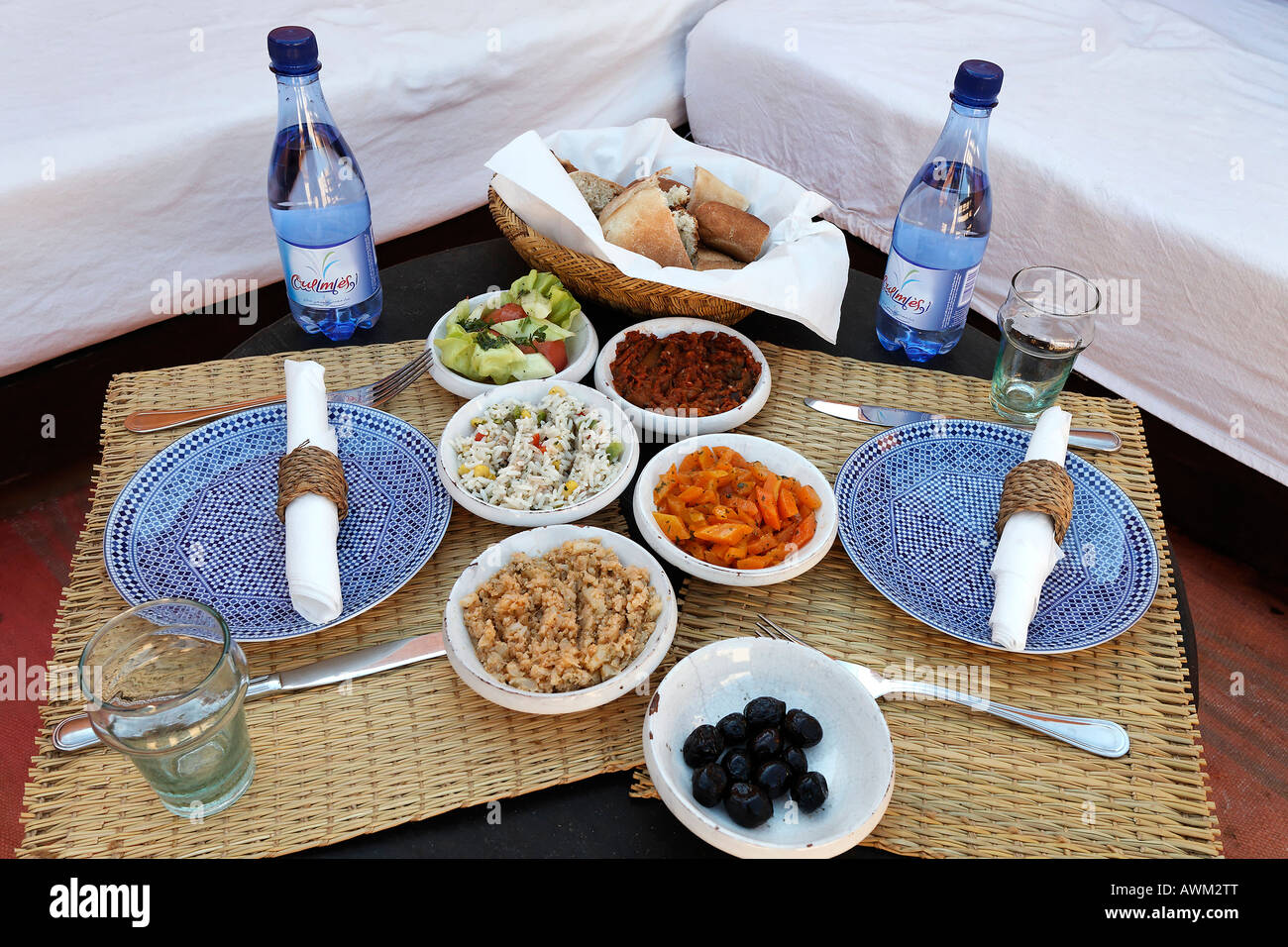 Low side table set for two, Moroccan hors d'oeuvres, Riad in the historic Medina quarter, Marrakesh, Morocco, Africa Stock Photo