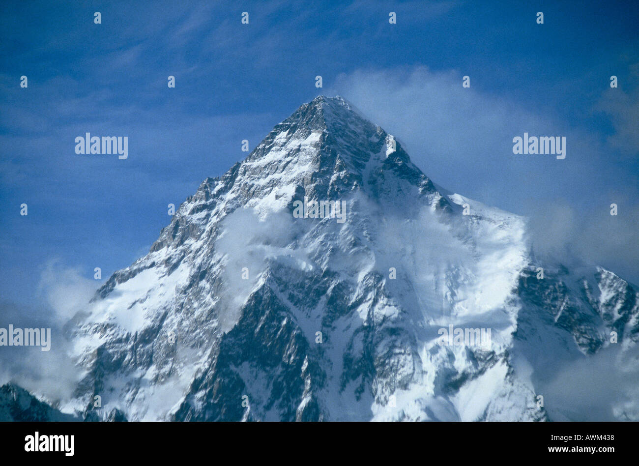Snowcovered mountain peak against the blue sky, Mt K2, Godwin Austen, Karakorum Range, Pakistan Stock Photo