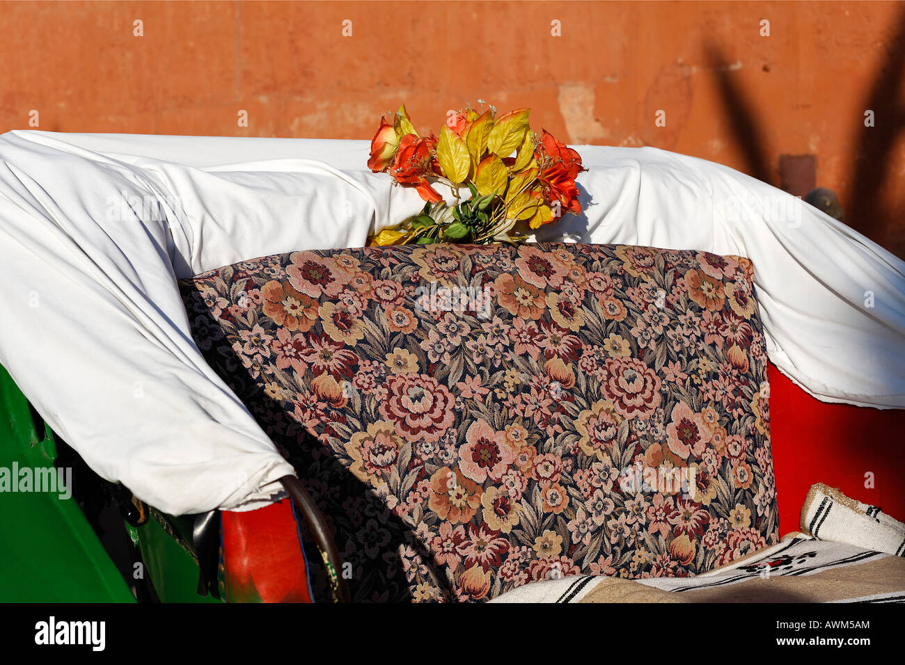 Seat of a horse-drawn carriage, decorated with artificial flowers, Marrakech, Morocco, Africa Stock Photo