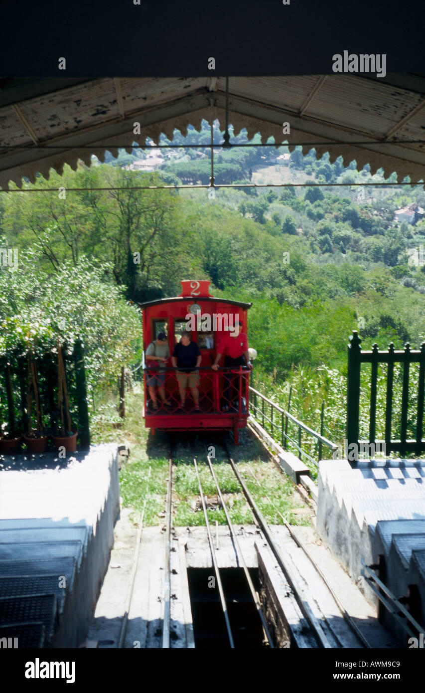 Train leaving platform on hill, Montecatini Alto, Tuscany, Italy Stock Photo