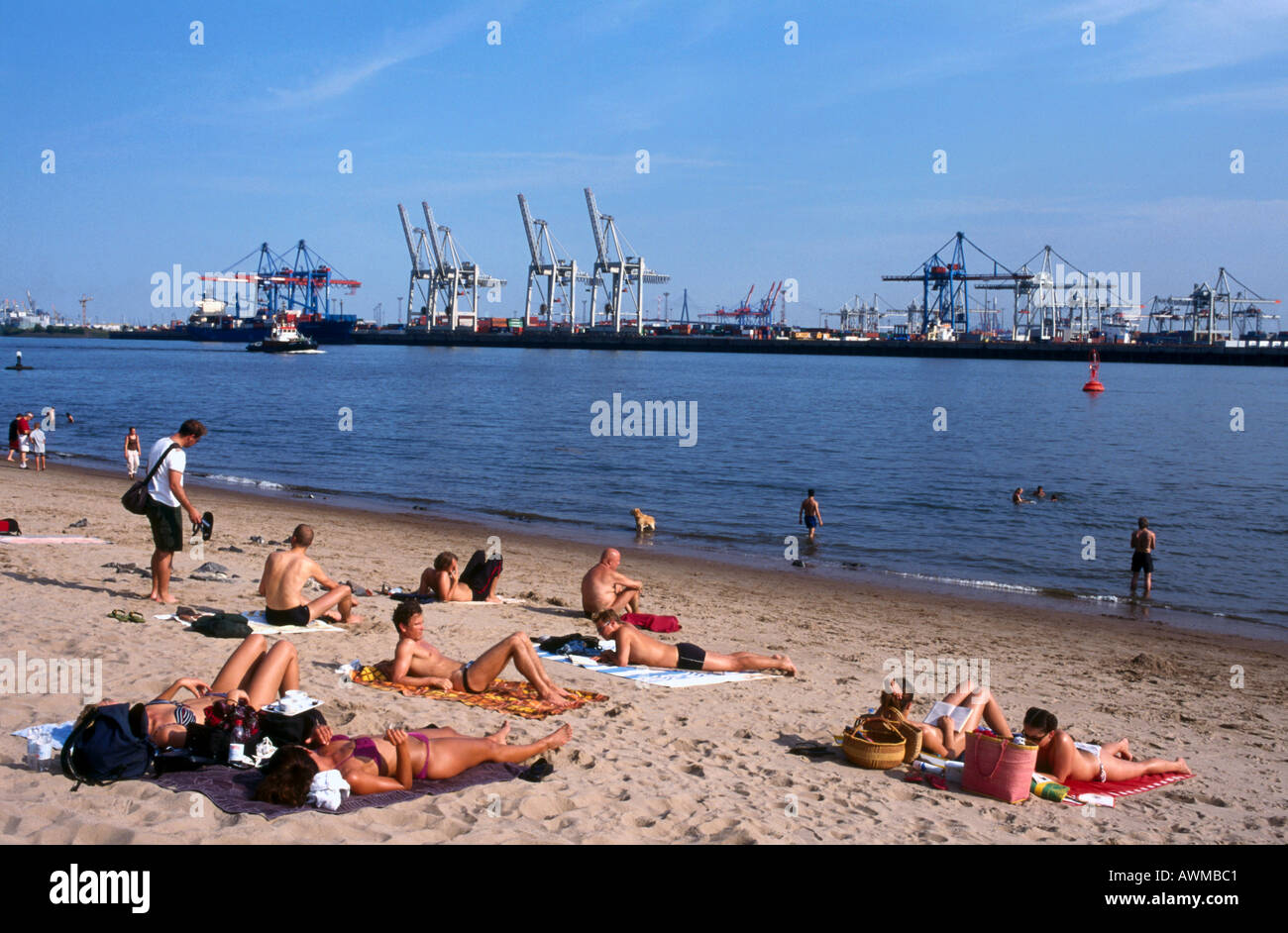 Tourists on beach, Elbe River, Oevelgoenne, Hamburg, Germany Stock Photo