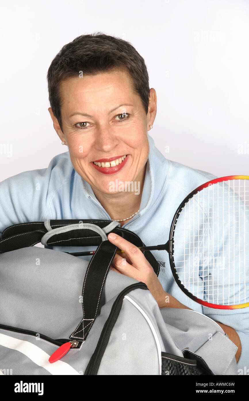 Woman with sporting equipment Stock Photo