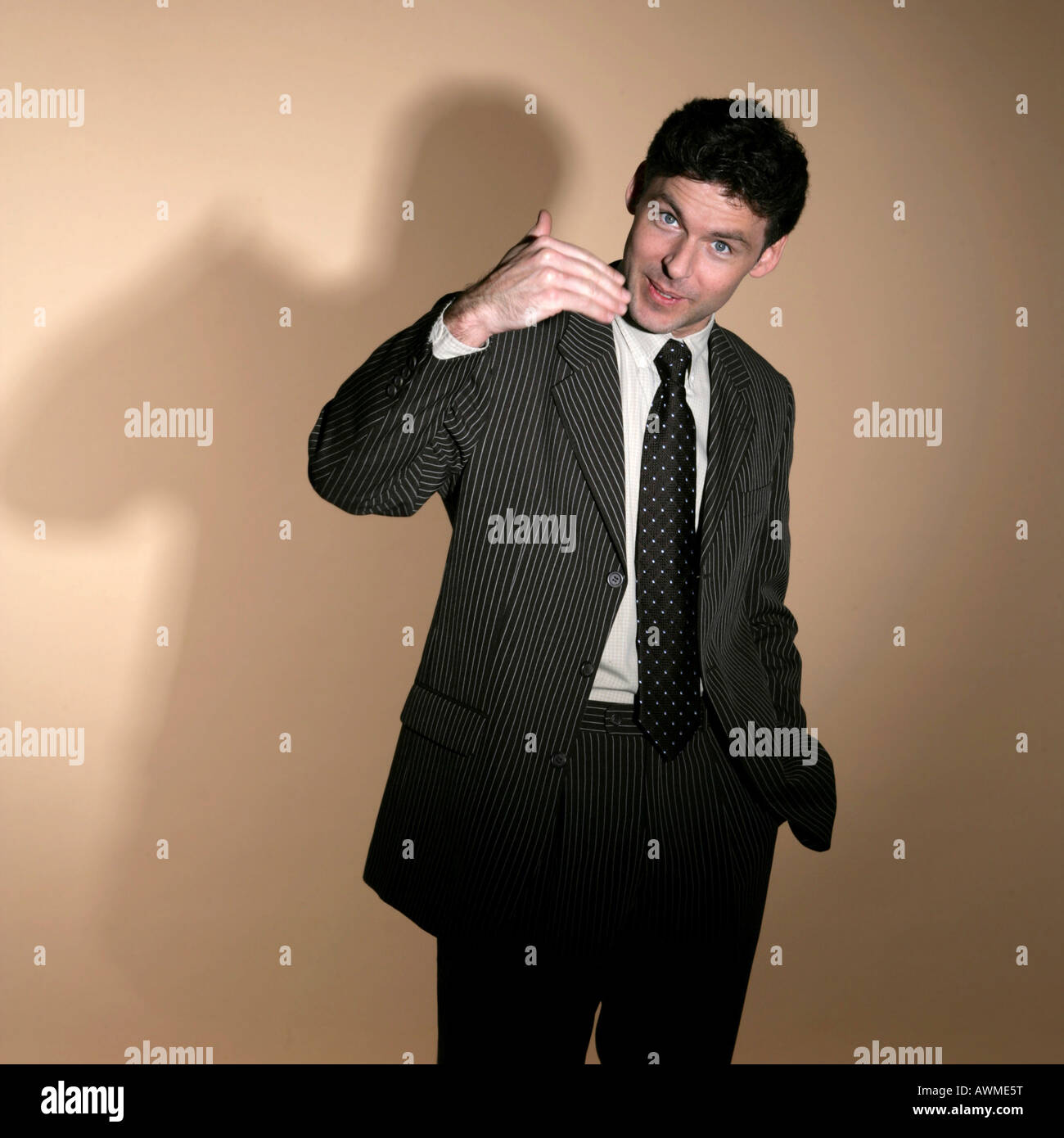 Business come here suit hand hi-res stock photography and images - Alamy