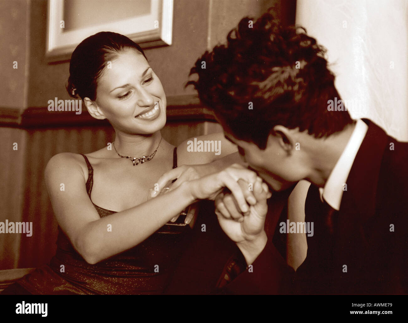 Man hand why kiss woman