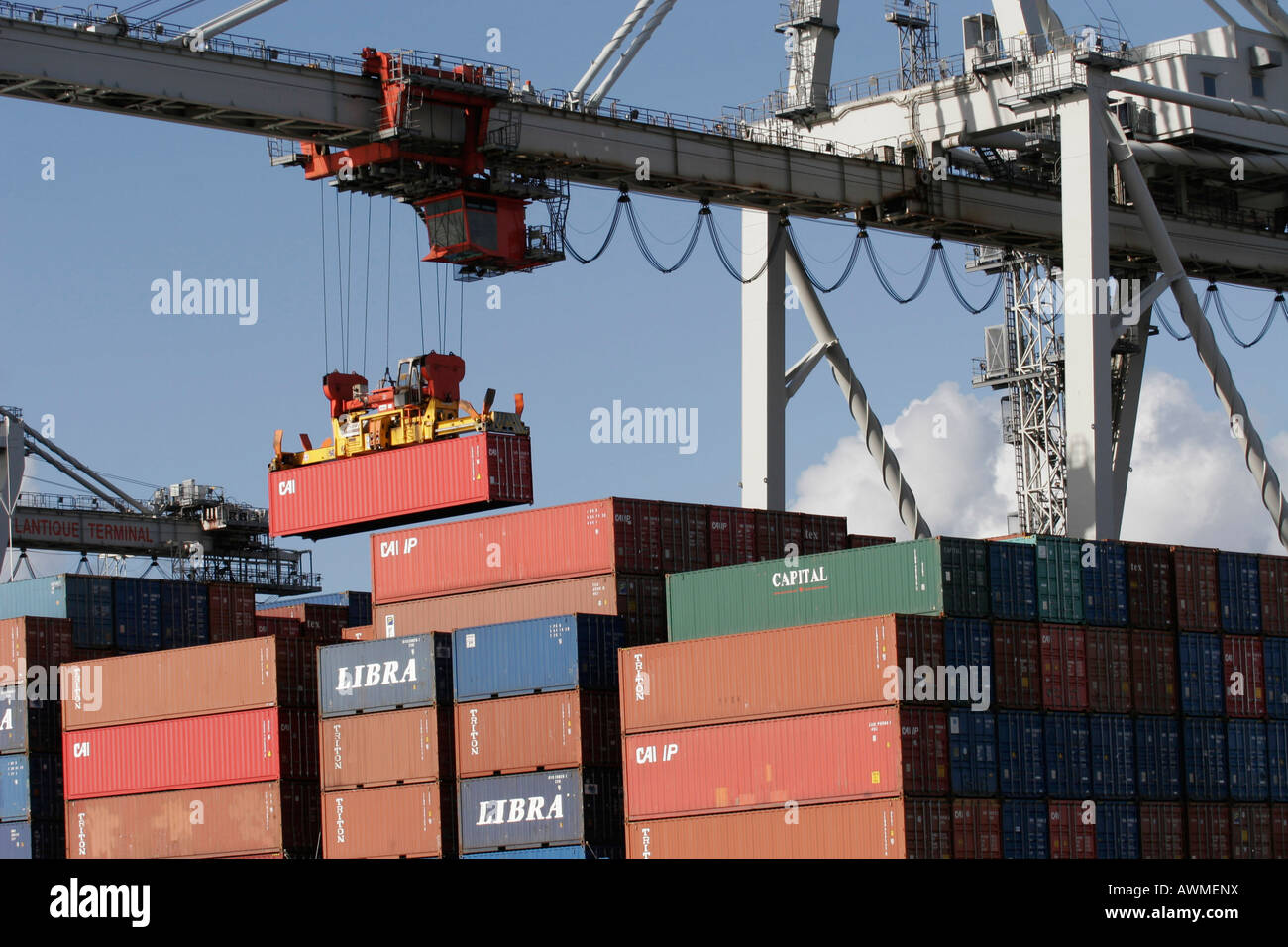 Crane lifting containers onto the Copiapo container ship the Port of Le