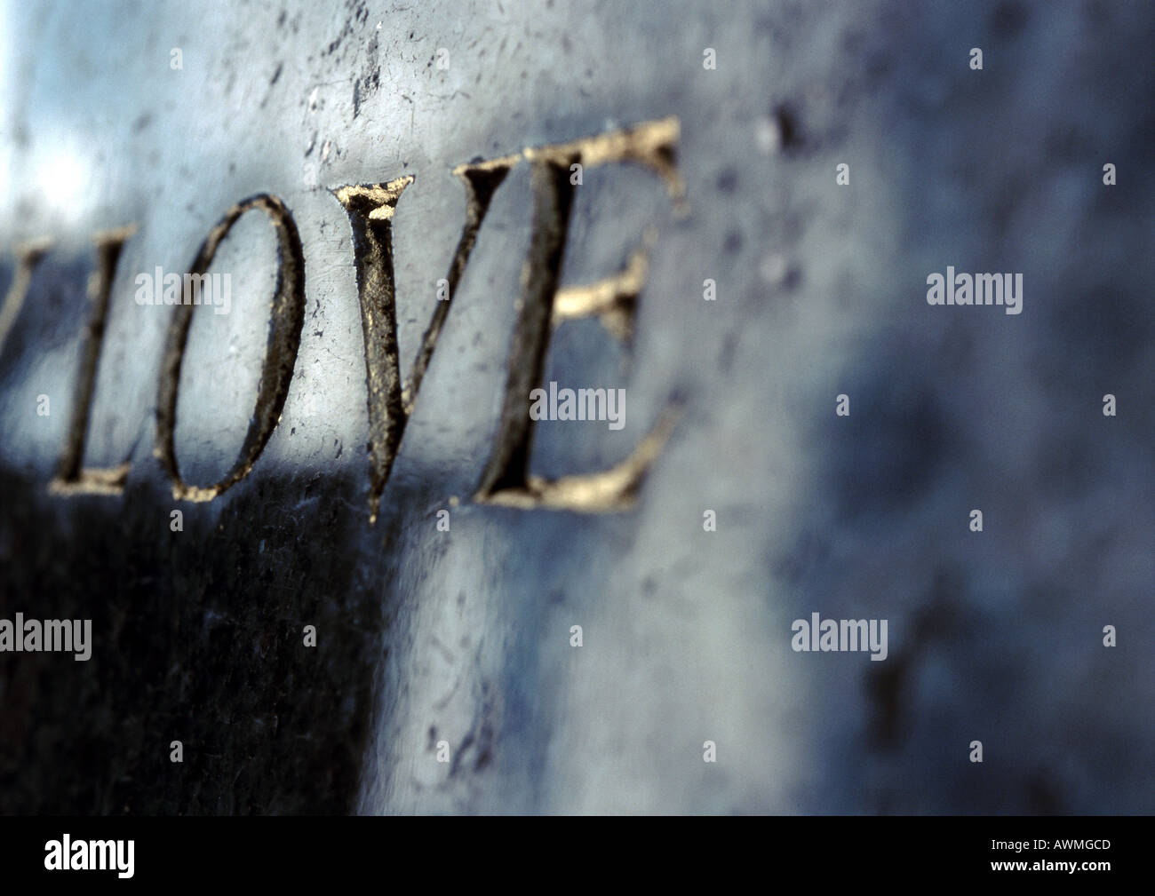 Love text embossed in gold Stock Photo