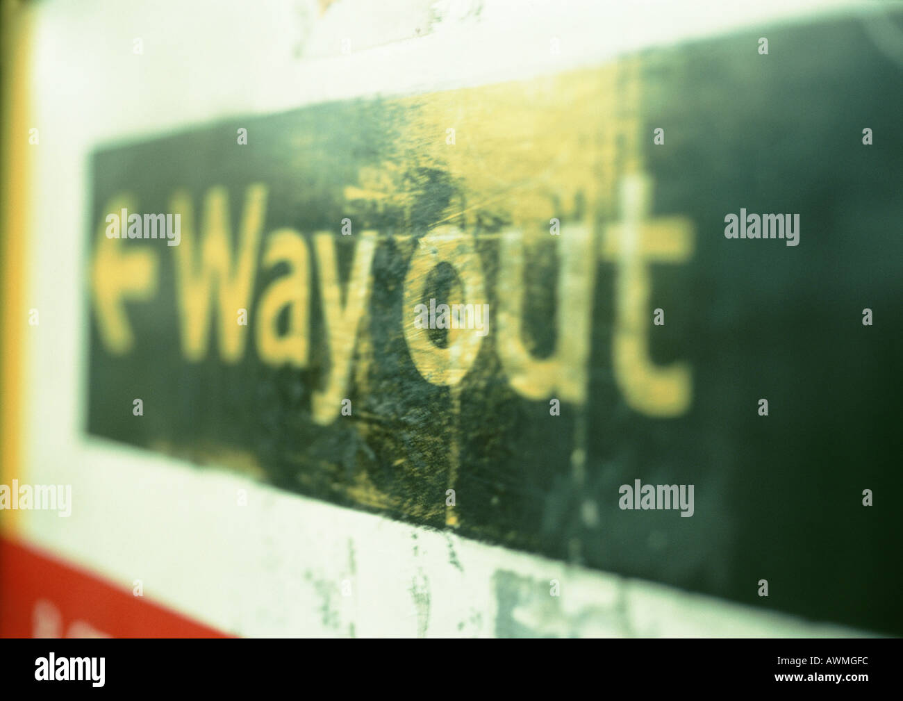 Way out text and arrow on sign, close-up Stock Photo