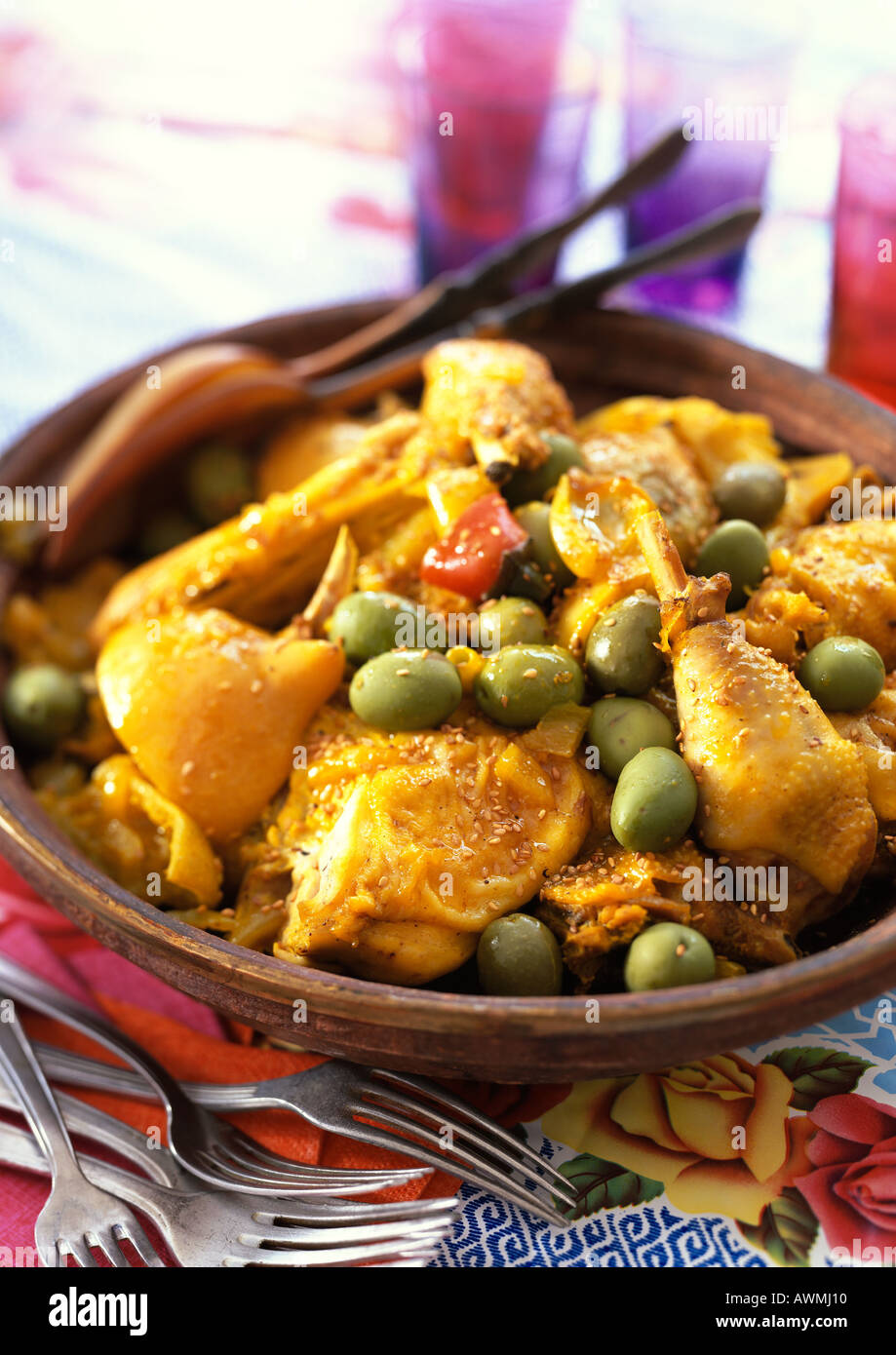 Chicken tagine, with green olives, in bowl, closeup Stock Photo Alamy