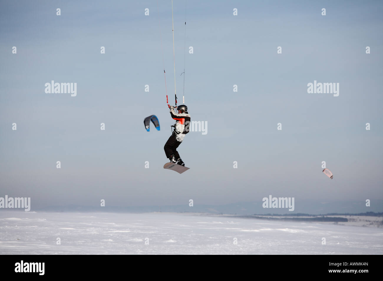 Snowkiting, kiteskiing, Mt. Wasserkruppe, Rhoen Mountains, Hesse, Germany, Europe Stock Photo