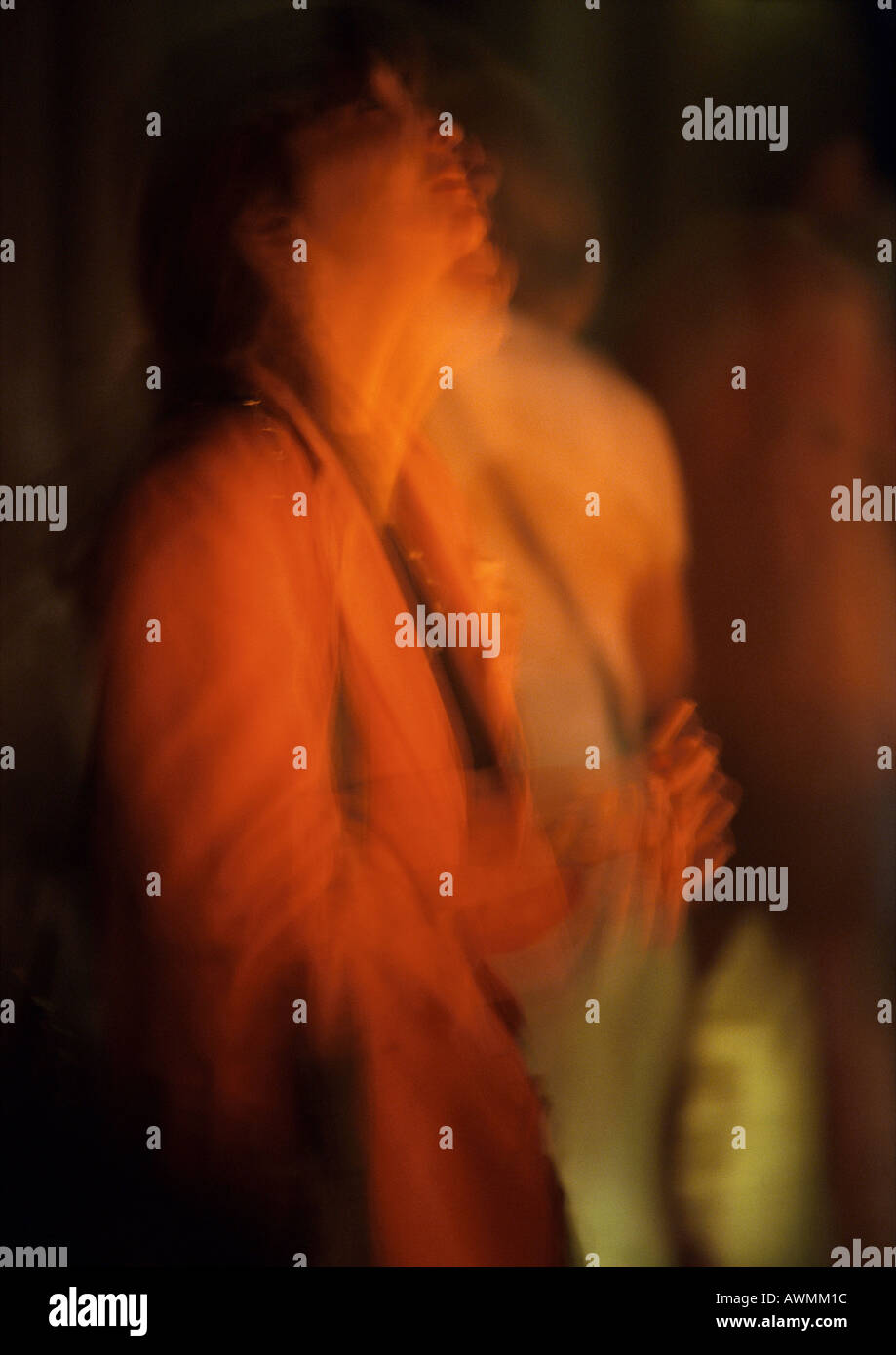 Silhouette of person in dark, blurred Stock Photo