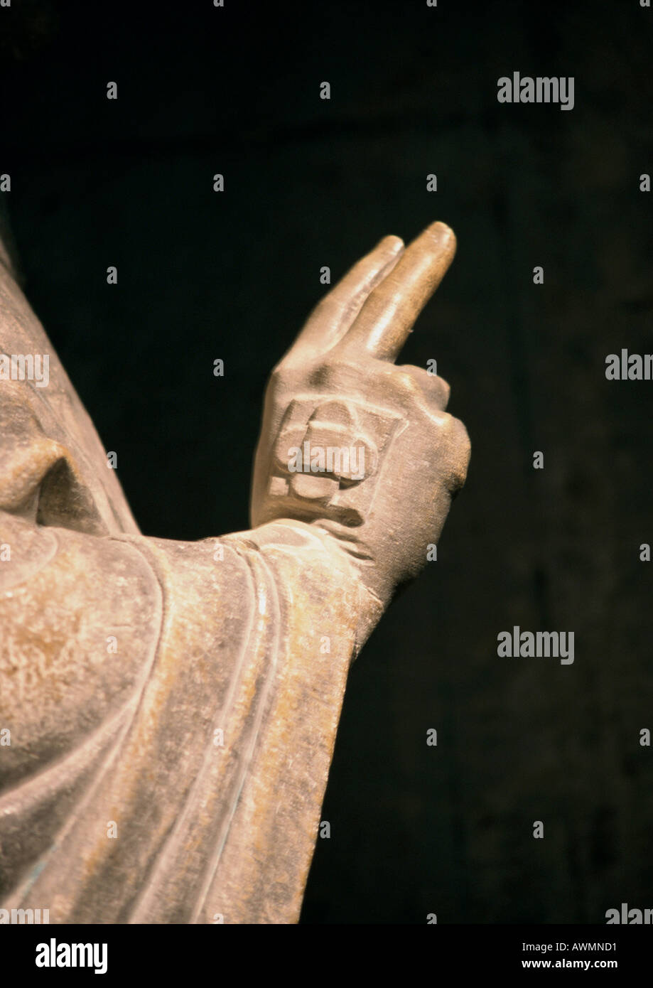 Statue, hand with two fingers making gesture, closeup Stock Photo Alamy