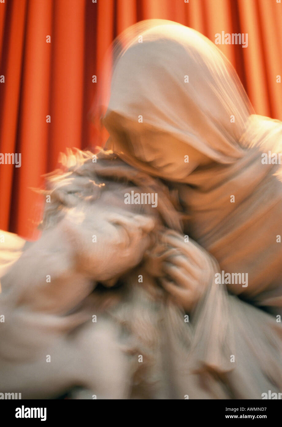 Statue of Virgin Mary and Christ, blurred Stock Photo