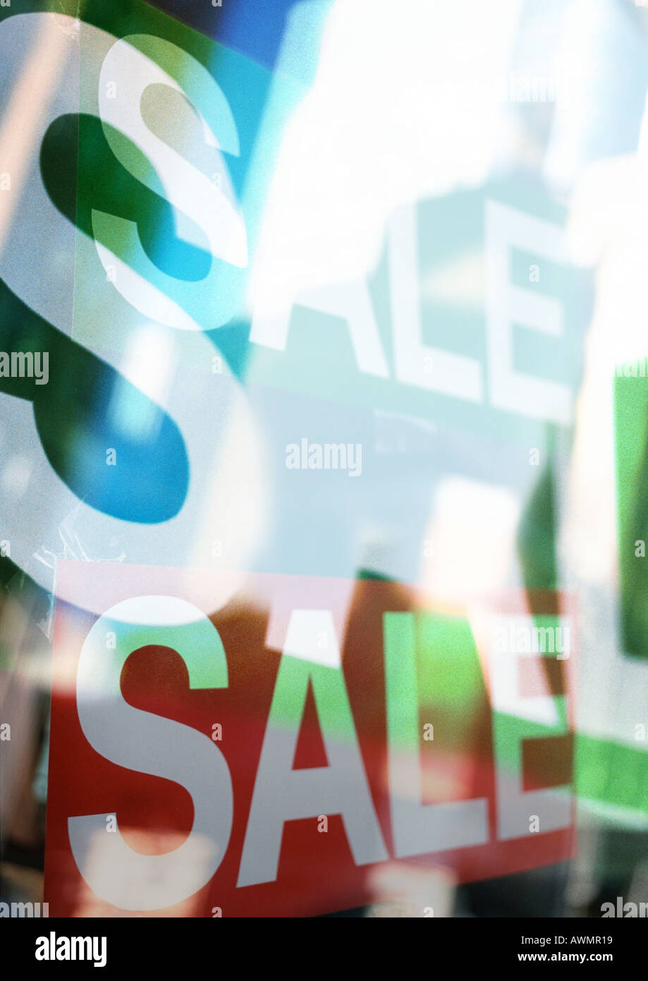 Word sale on shop windows, composite, close-up Stock Photo