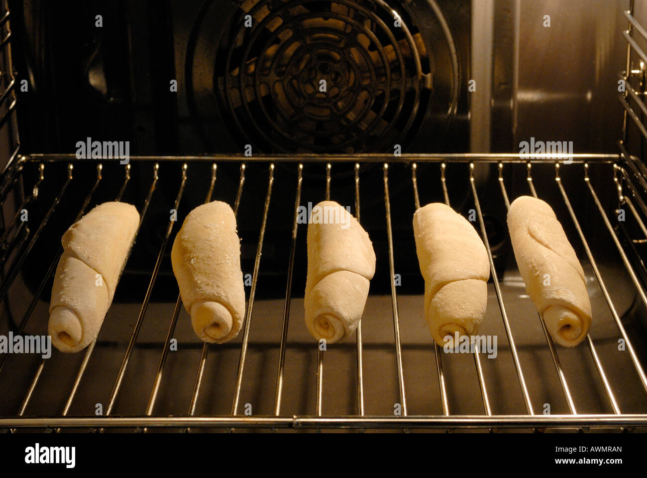 Depp-frozen crude dough in an oven Stock Photo
