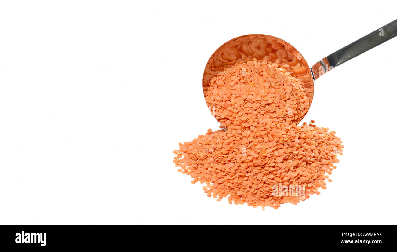 Dried red lentils with a soup ladle Stock Photo