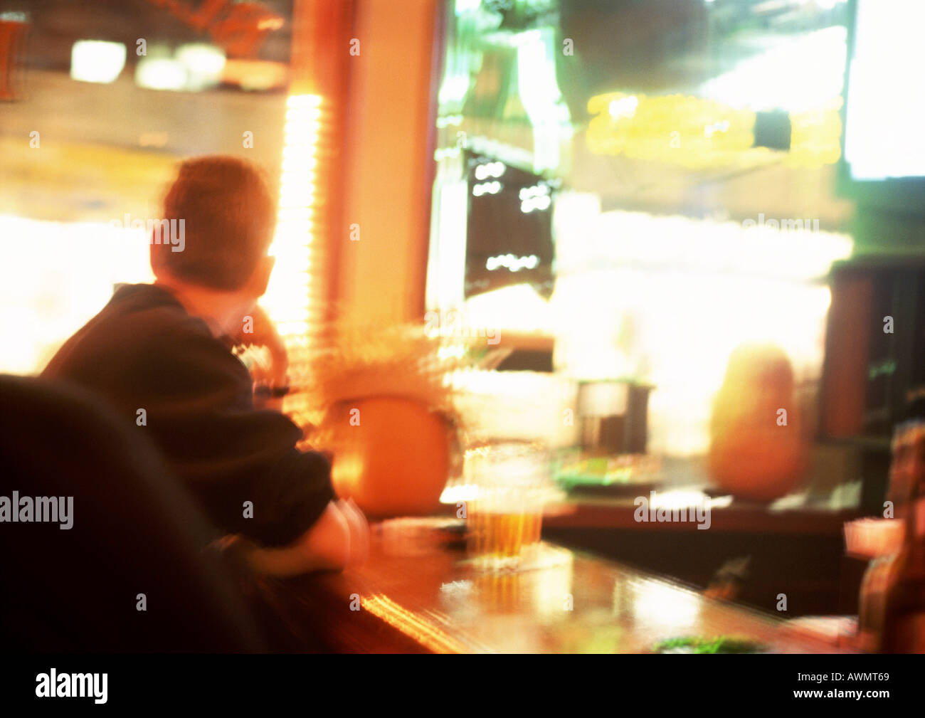 Man leaning on bar backlit hi-res stock photography and images - Alamy