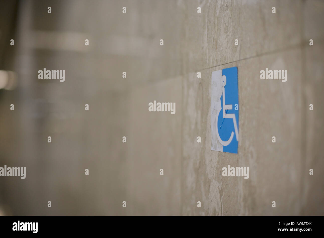 disability sign on a wall Stock Photo Alamy