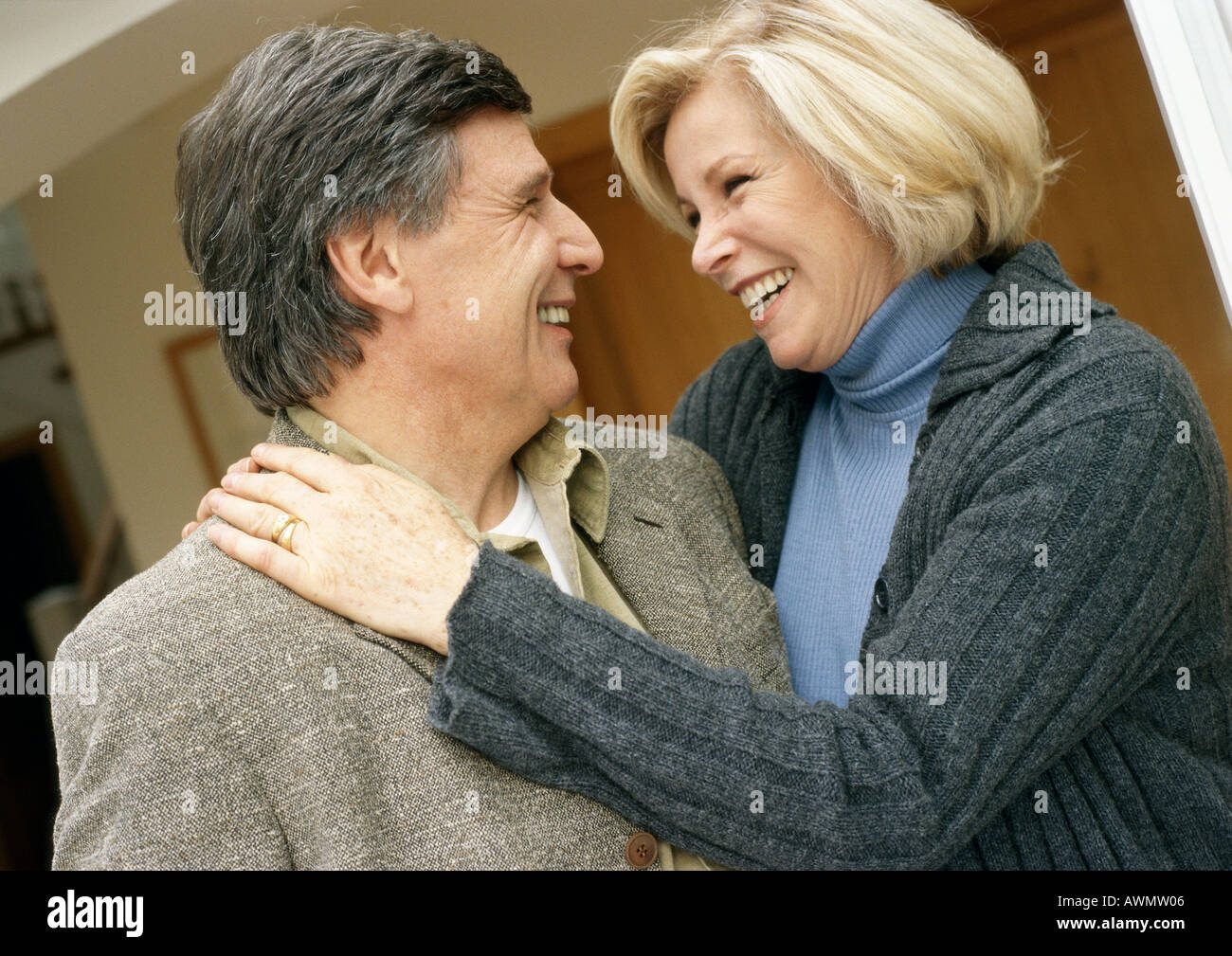 Woman arms around man wedding hi-res stock photography and images - Alamy
