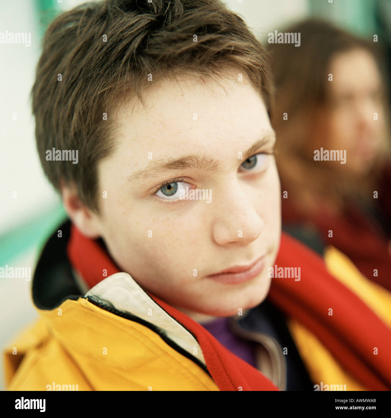 Young man looking at camera, close up portrait. Stock Photo
