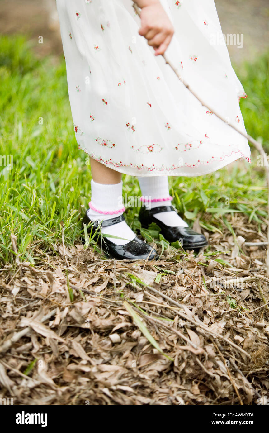 Close up of girl in dress shoes Stock Photo