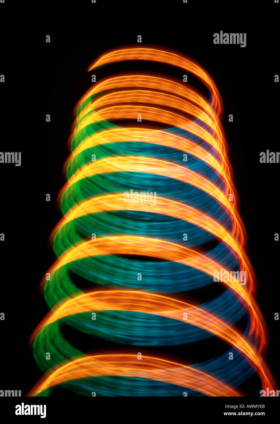 Cylindrical light effect, oranges, greens and blues. Stock Photo
