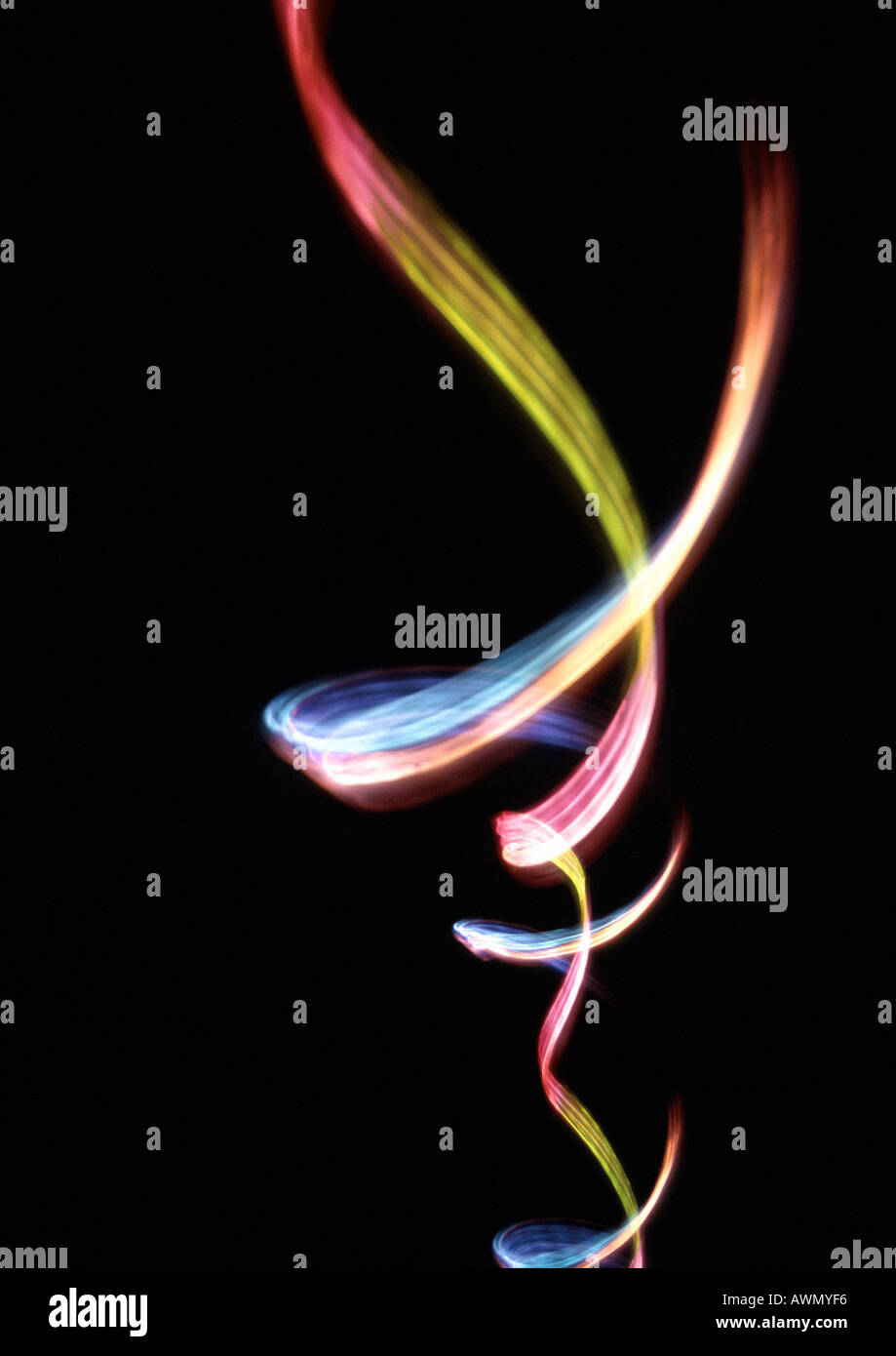 Light effect, multi-colored trail against black background Stock Photo