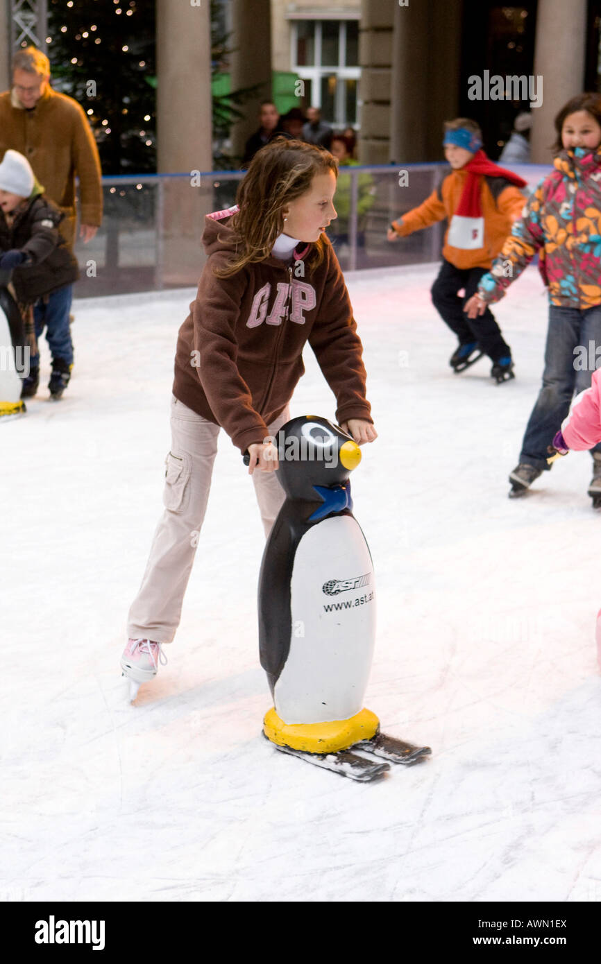 Children skating on artificial rink in the city centre, Frankfurt, Hesse, Germany, Europe Stock Photo