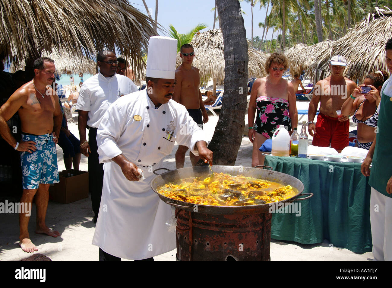 Cook preparing paella on the beach in Punta Cana, Dominican Republic, Caribbean, Americas Stock Photo