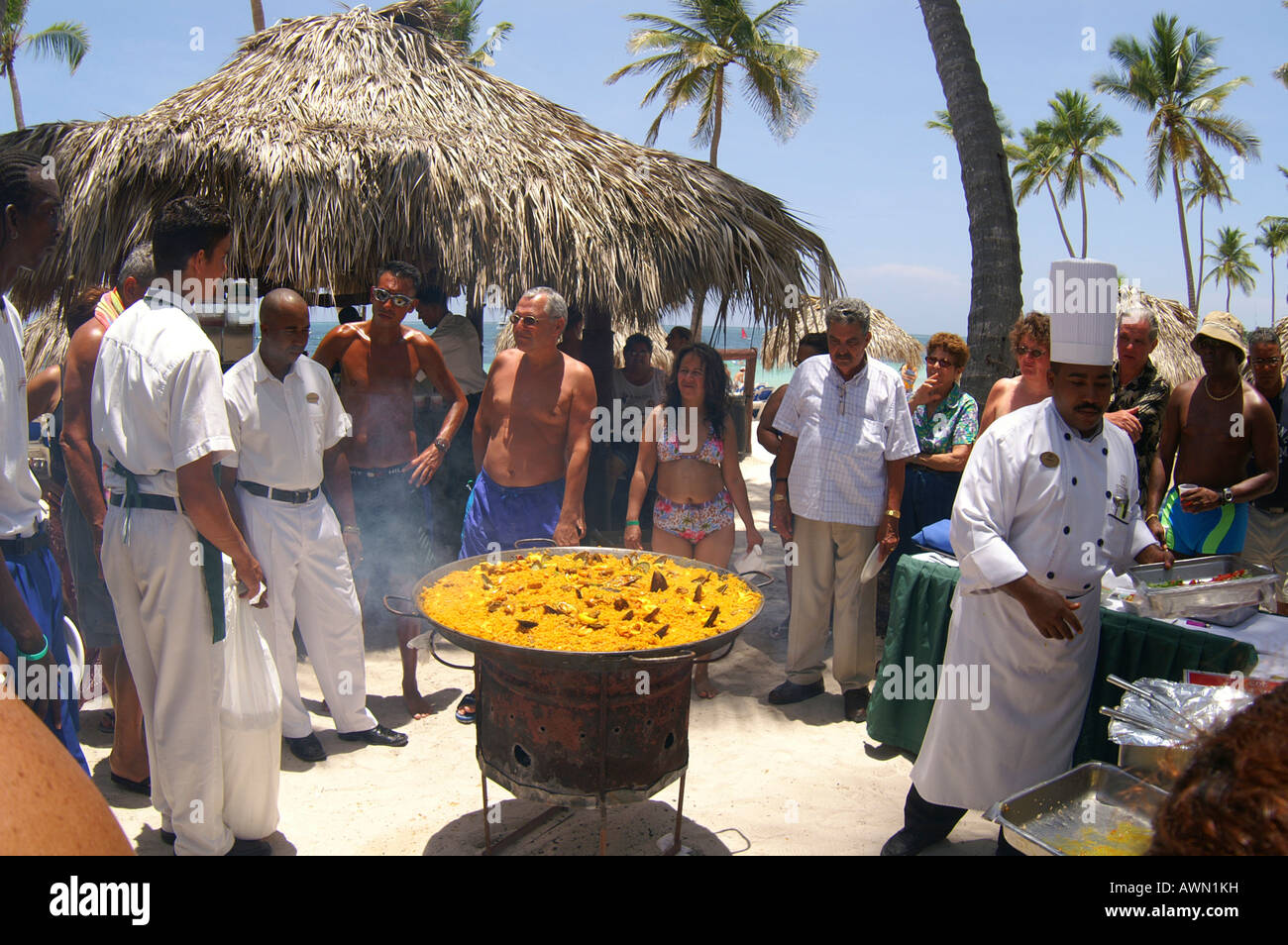 Cook preparing paella on the beach in Punta Cana, Dominican Republic, Caribbean, Americas Stock Photo