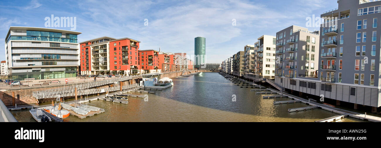 Panoramic view of modern luxury condos with private docking facilities and the Westhafen Tower, Westhafen Square, Frankfurt, He Stock Photo