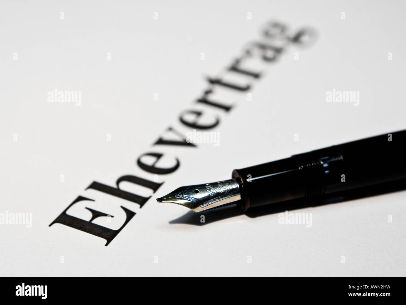Fountain pen laying on a marital contract Stock Photo