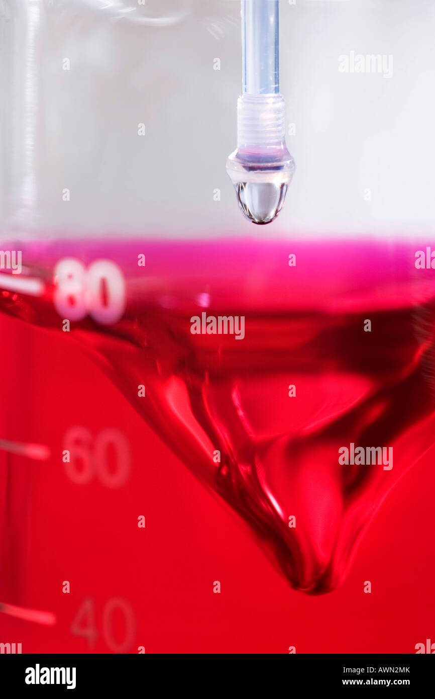 Phenolphthalein solution into which a drop of potassium hydroxide is dropped, acid-base-titration, quality assurance, Weleda AG Stock Photo
