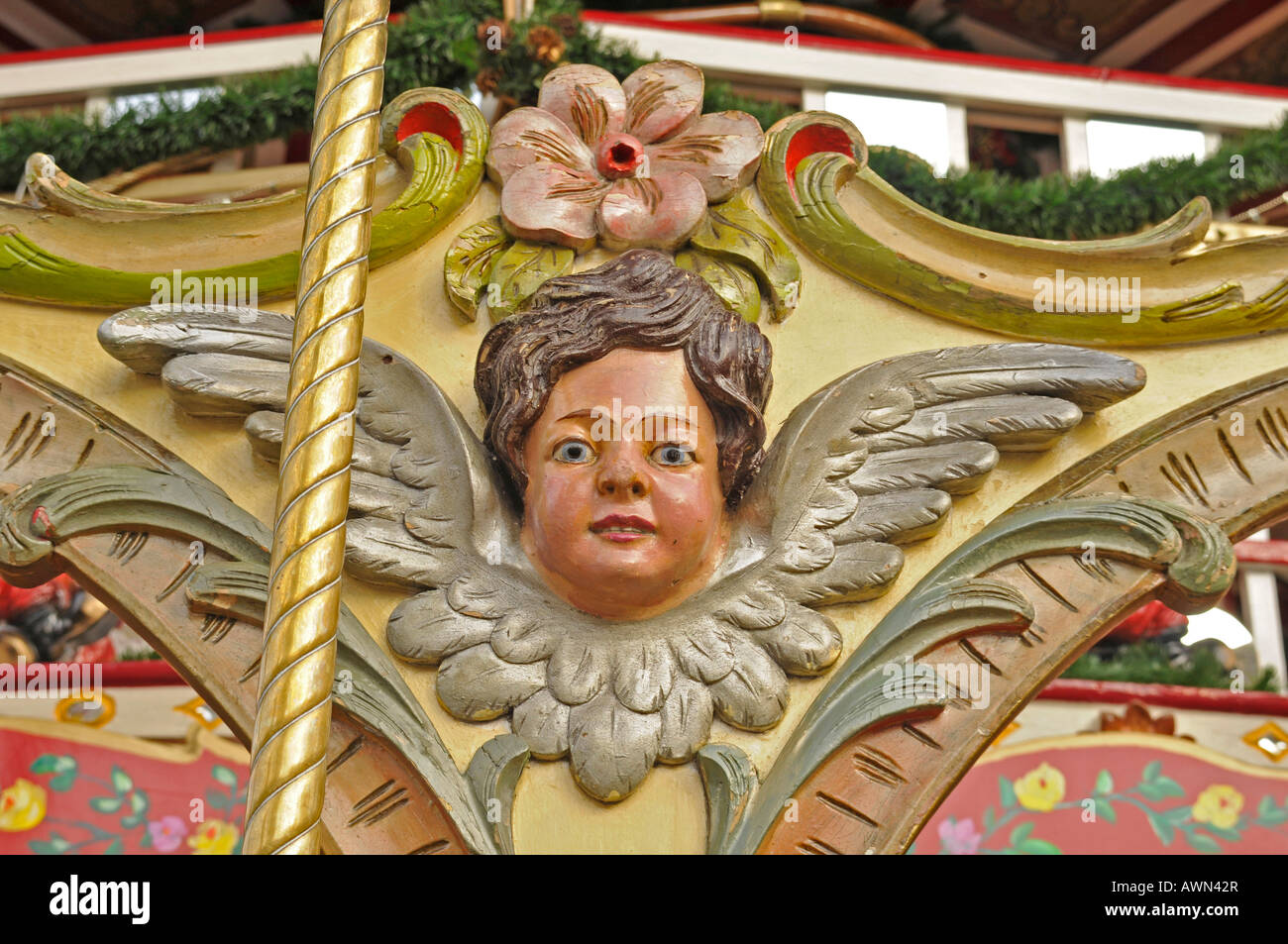 Winged head on a carousel, Erfurt, Thuringia, Germany, Europe Stock Photo