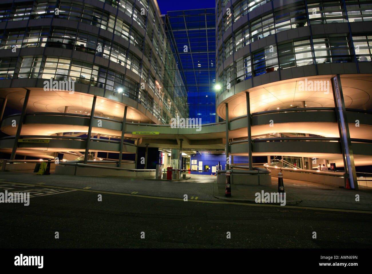 Tower Place Building And Parking Garage Entrance At Dusk London