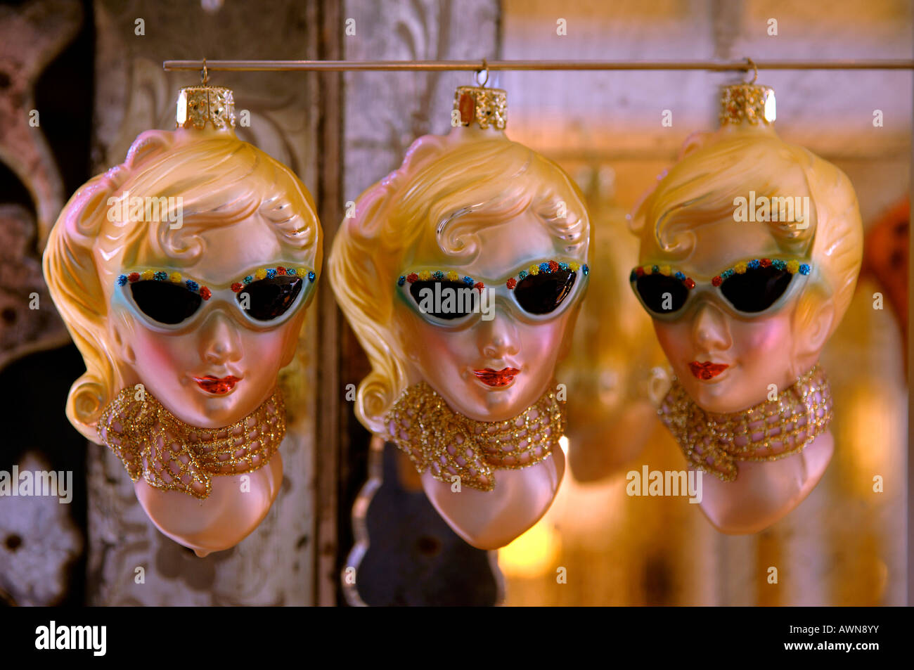 Retro ornaments from the 1950s, three blonde woman wearing sunglasses and scarf and red purse Stock Photo