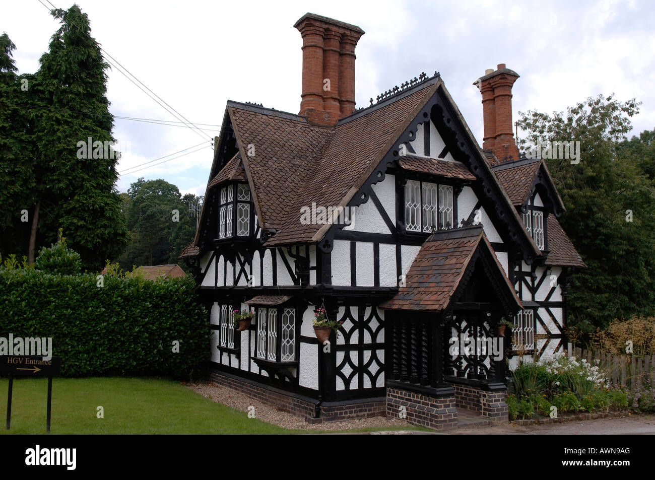 Old English Tudorbethan house with two chimneys, part of Ragley Hall, Alcester, Warwickshire, West Midlands, England, Europe Stock Photo