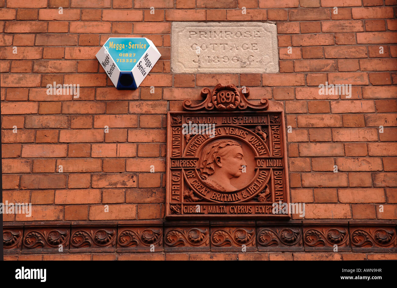 Plaque commemorating Queen Victoria's 60th birthday, house facade in Atherstone, Warwickshire, West Midlands, England, Europe Stock Photo