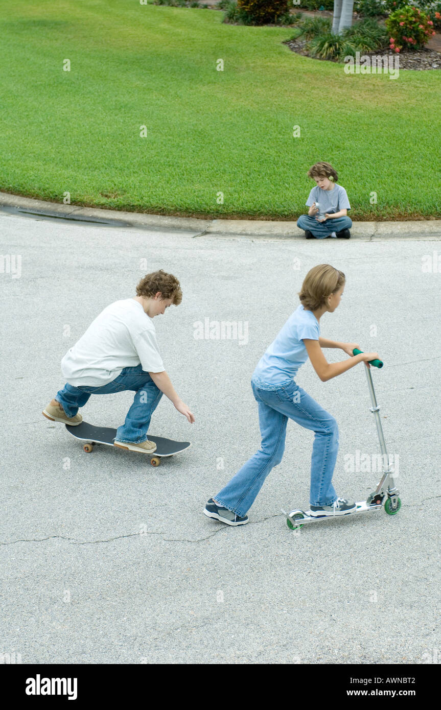 Children playing in suburban street Stock Photo