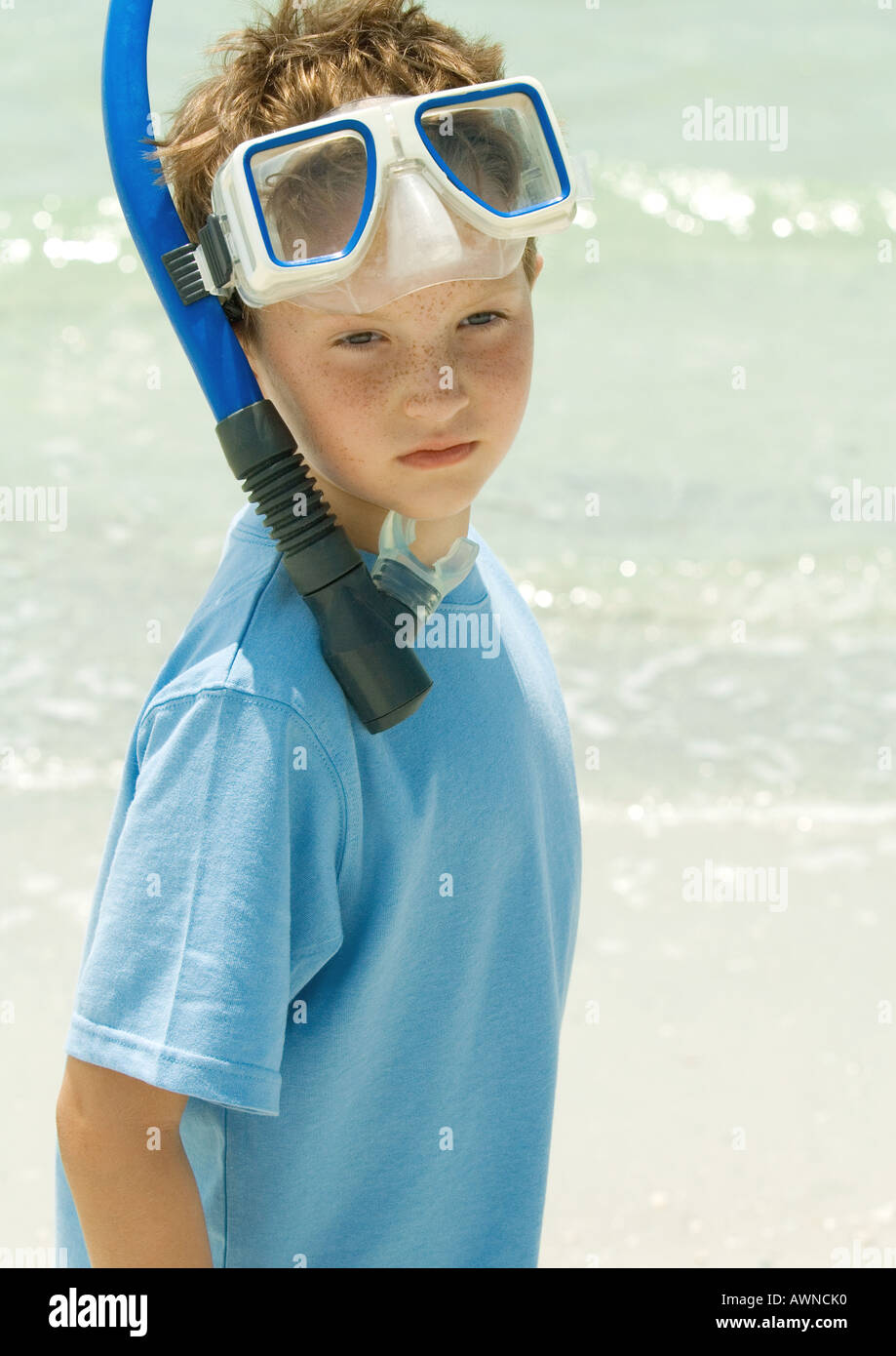 Boy wearing snorkeling gear on beach Stock Photo Alamy
