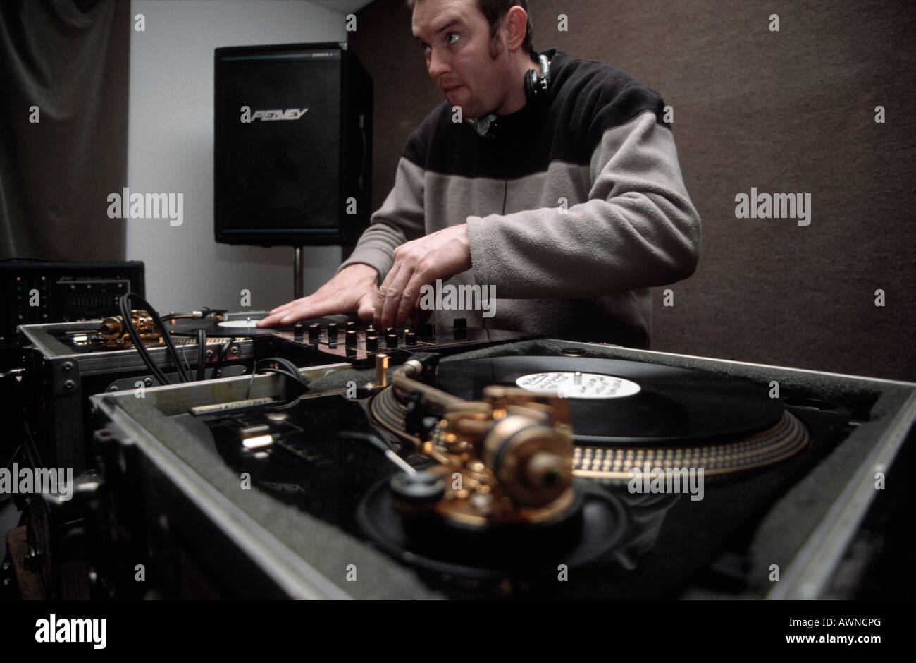DJ mixing in studio Stock Photo