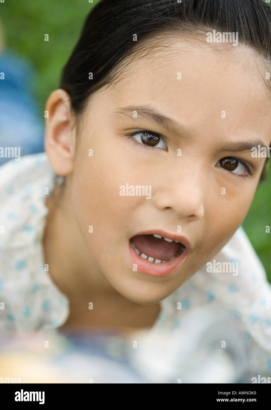 Girl making annoyed face Stock Photo - Alamy