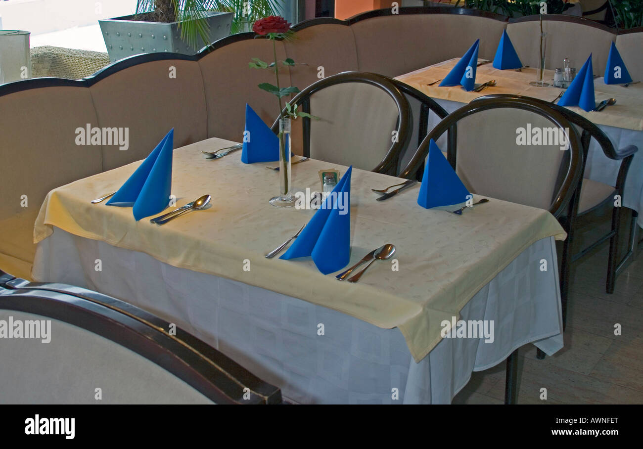 Tables setup for dinner in a hotel Stock Photo Alamy