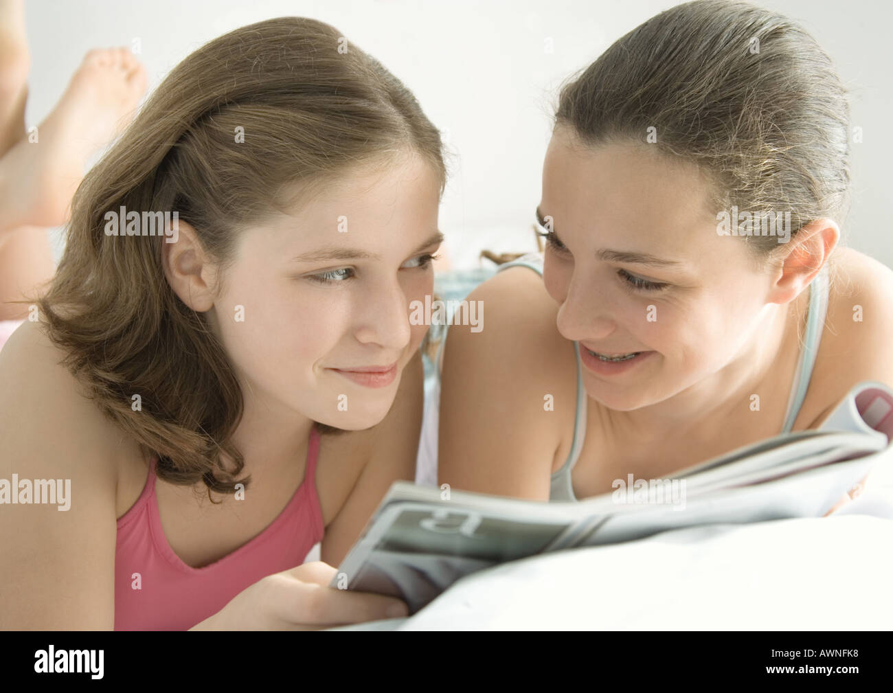 Preteen girl lying on stomach hi-res stock photography and images - Alamy