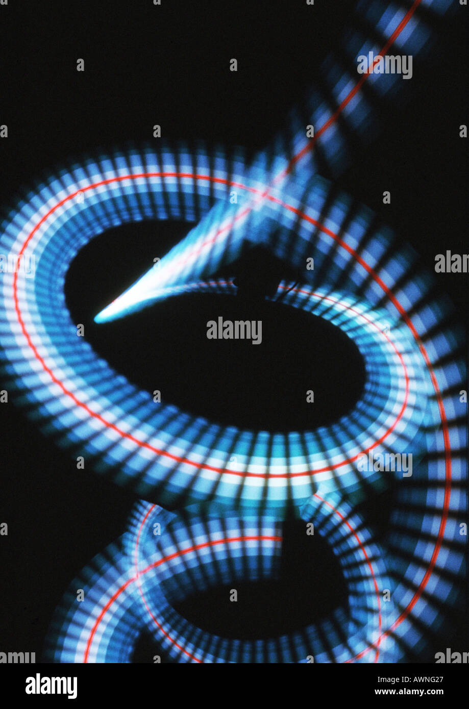 Spiraling light effect, blues, reds and white, black background Stock Photo