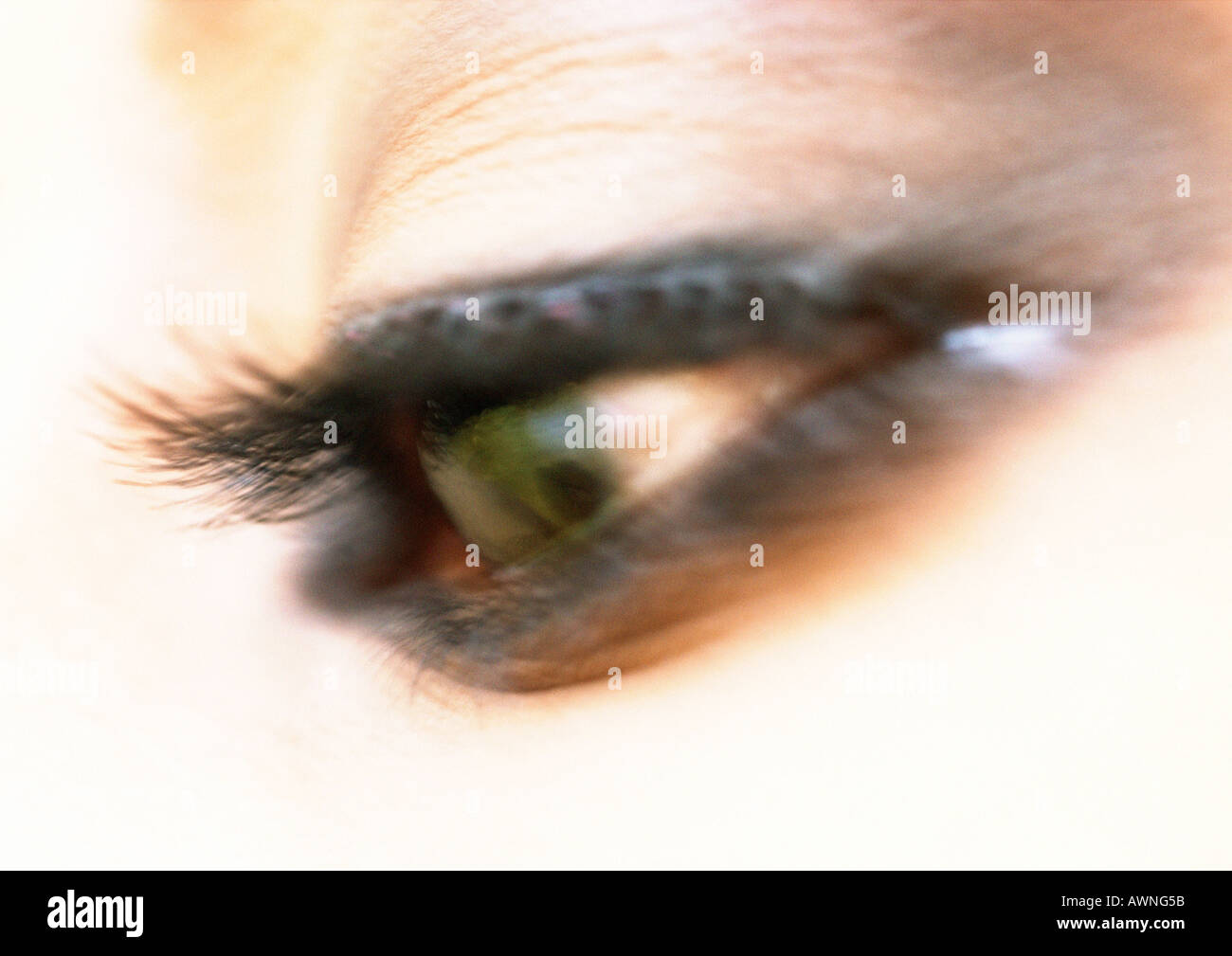 Woman's brown eye looking down, blurred close up Stock Photo Alamy