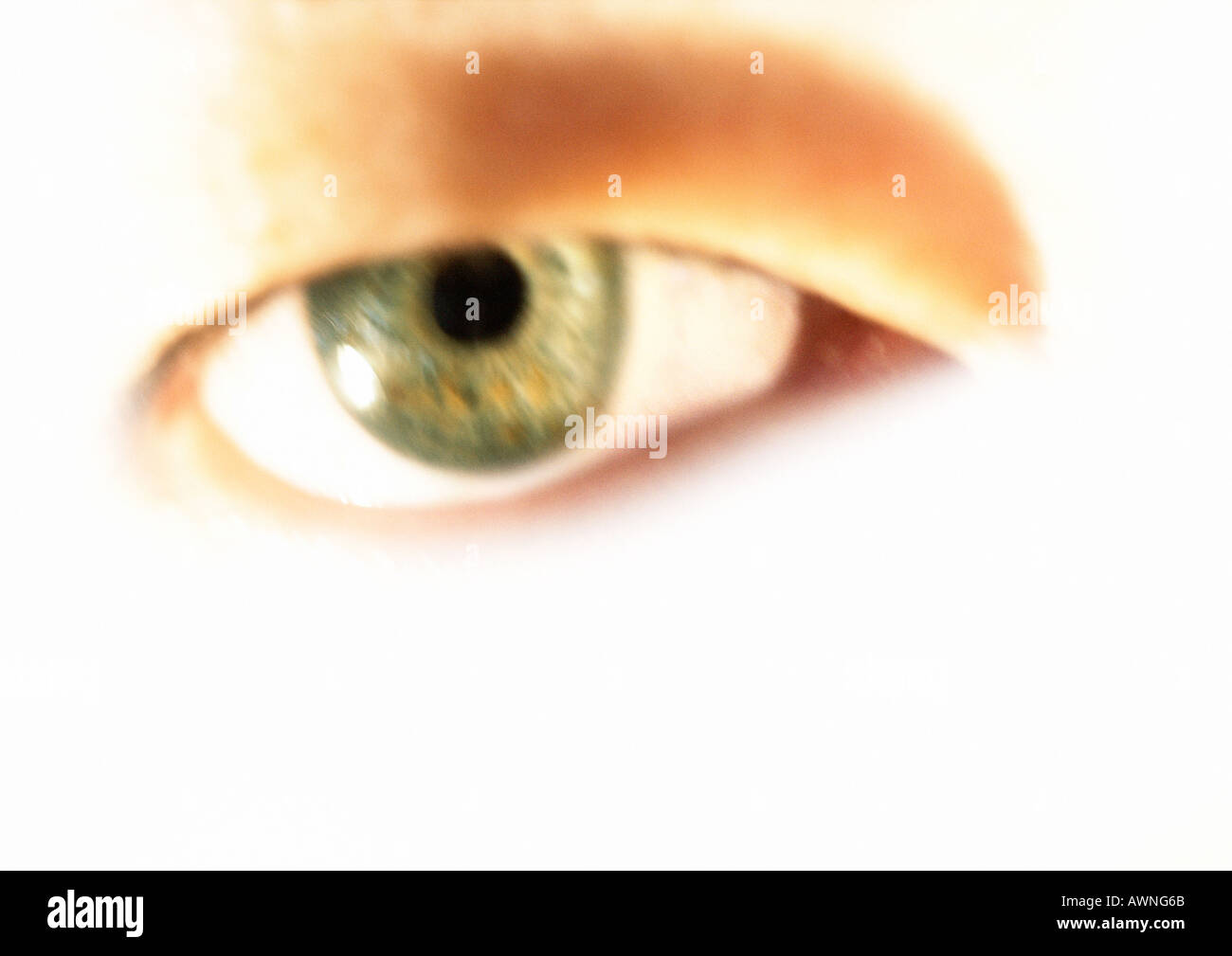 Woman's green eye, blurred close up. Stock Photo