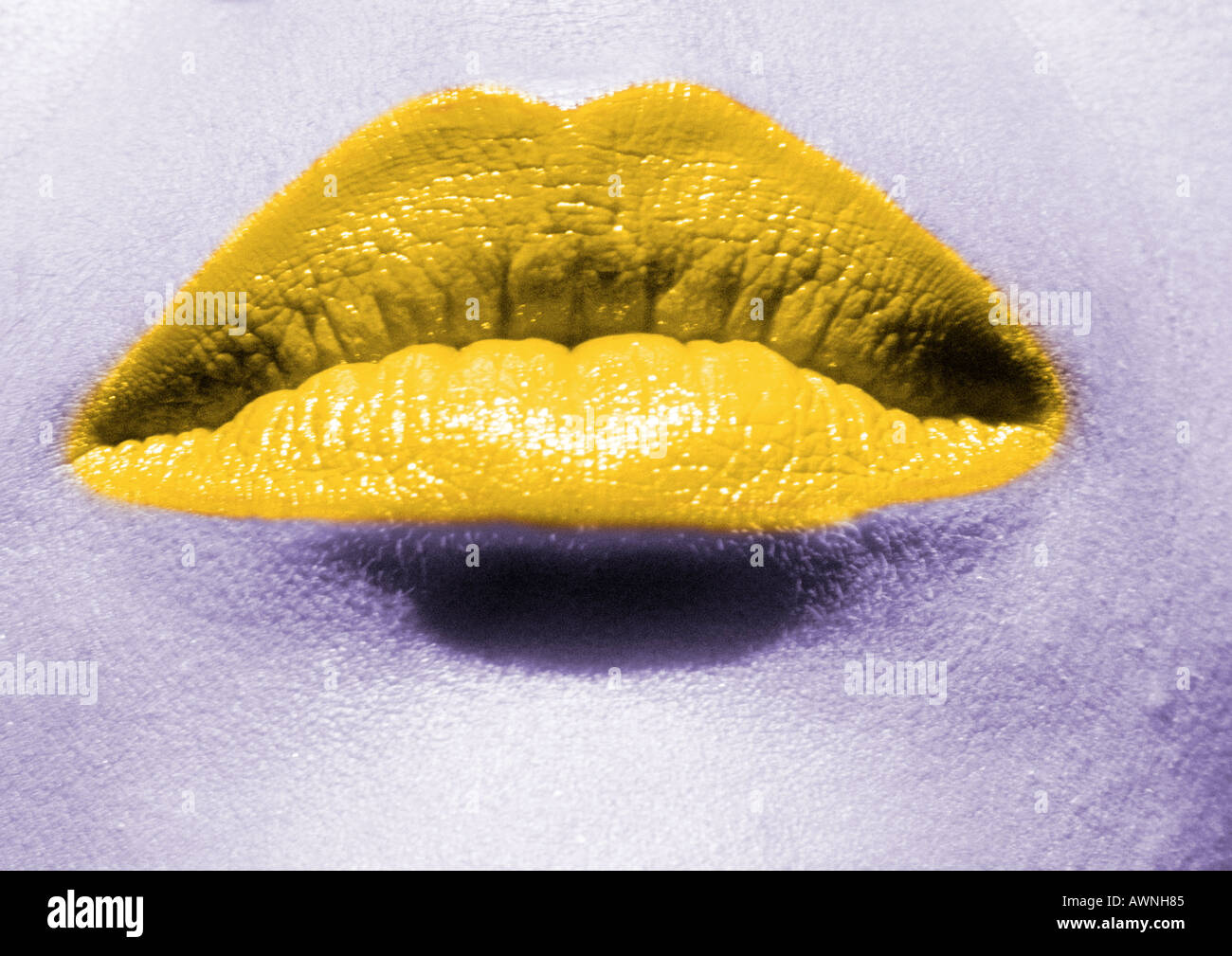 Close up of woman's mouth with yellow lipstick Stock Photo Alamy