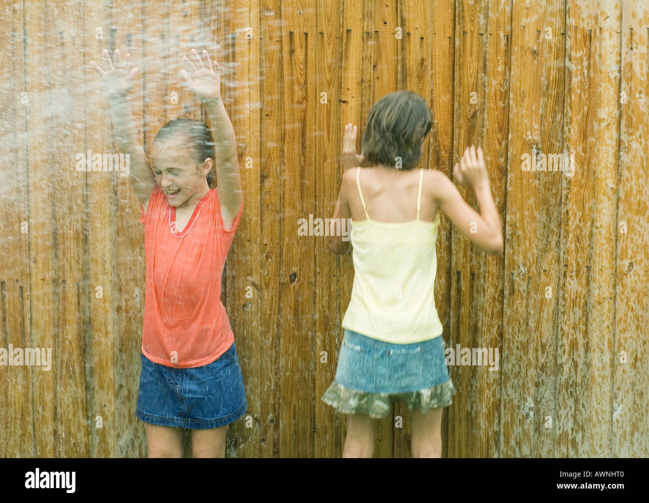 Kids getting soaking wet hires stock photography and images Alamy