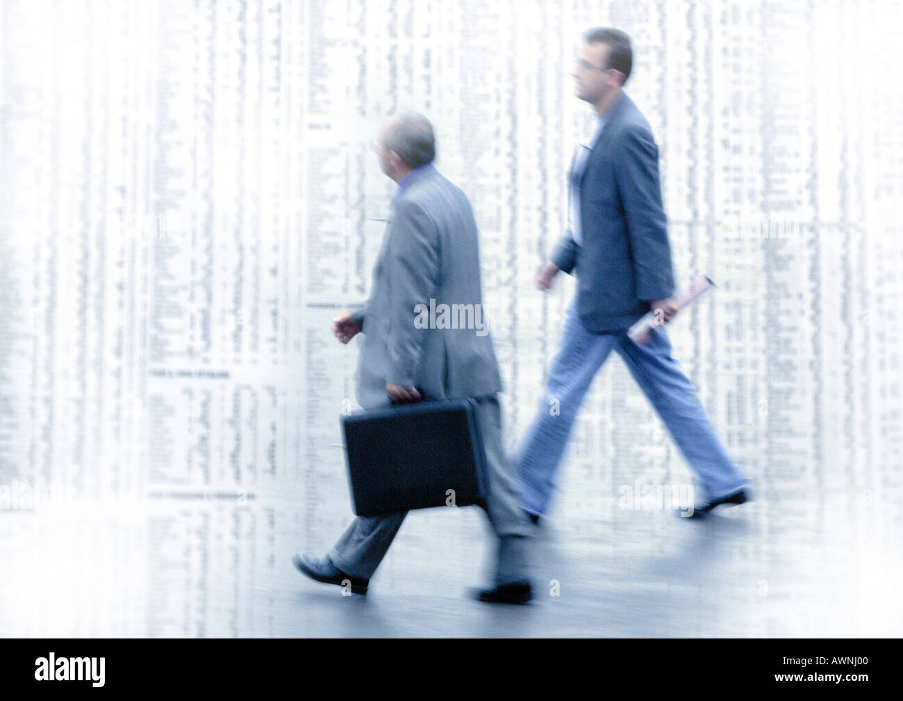 Two men walking on stock quotes, montage Stock Photo